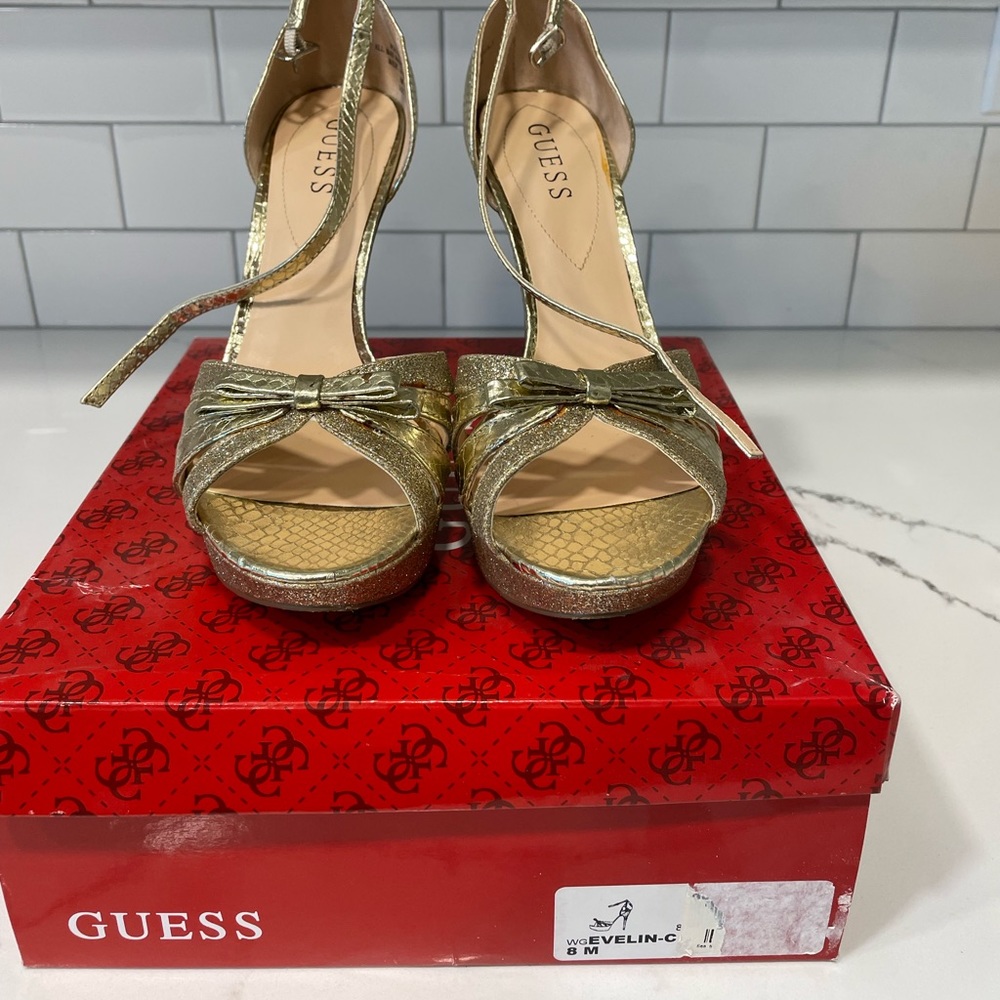 Guess gold snakeskin 3.5 heels worn just a couple times.